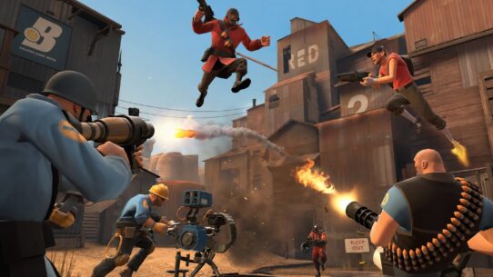 Team Fortress 2 promotional artwork showing RED and BLU team characters battling in an industrial setting with weapons and explosions