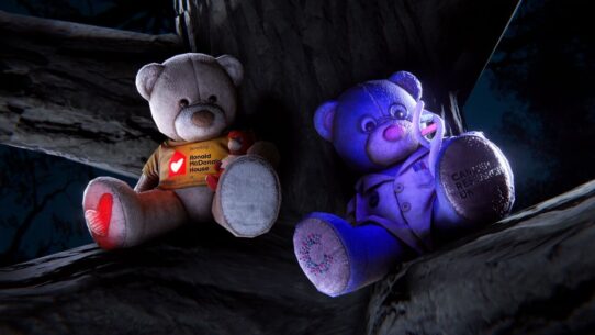 Two charity teddy bear charms in Dead by Daylight: one benefiting Ronald McDonald House UK, one benefiting Cancer Research UK